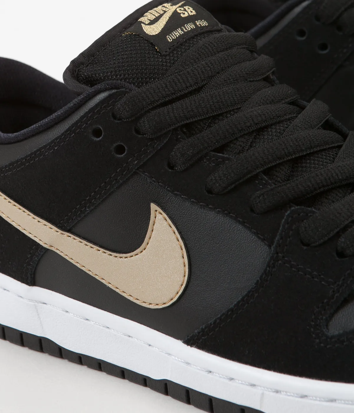 Nike SB Dunk Low Pro Shoes - Black / Metallic Gold - White