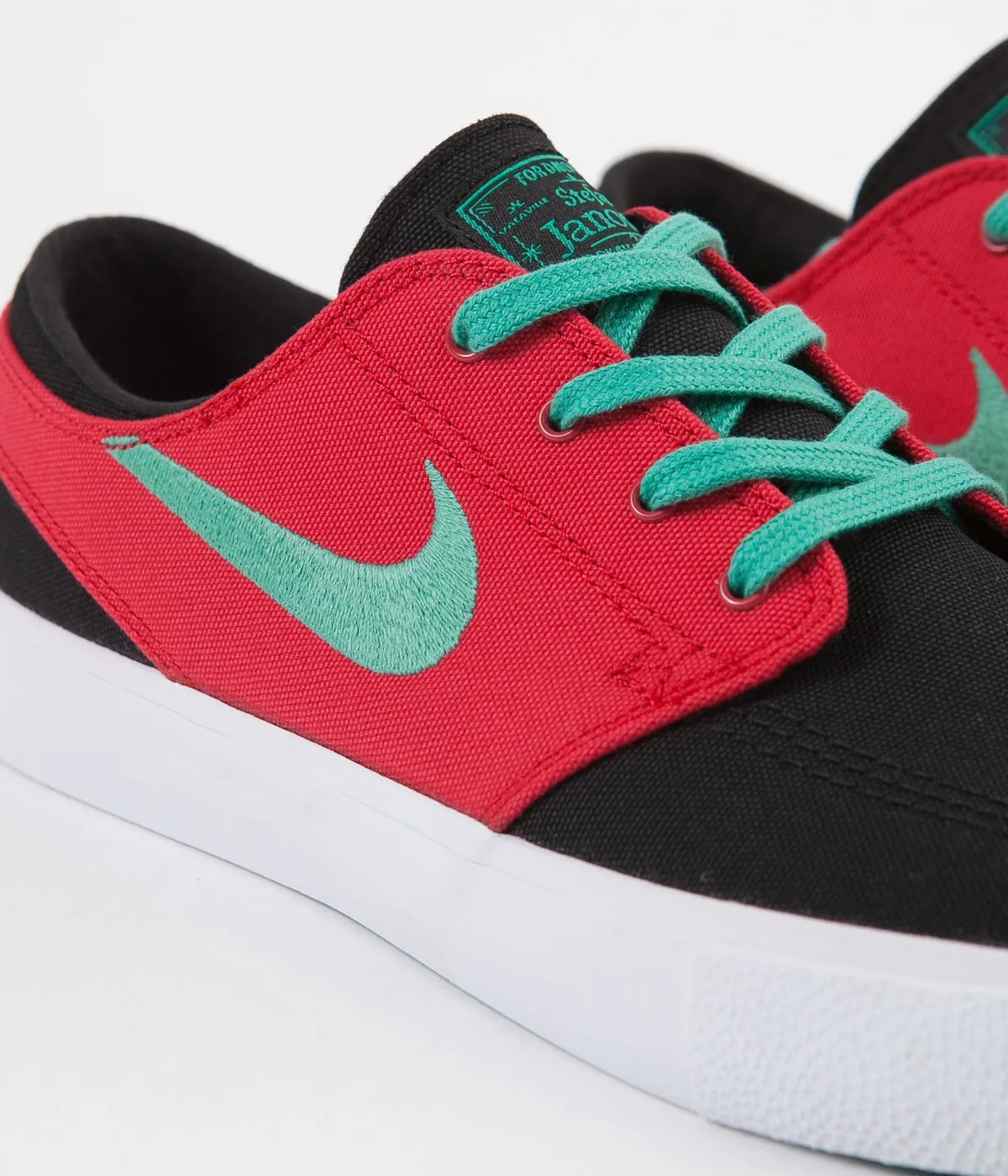 Nike SB Janoski Canvas Remastered Shoes - Black / True Green - Atom Red - White
